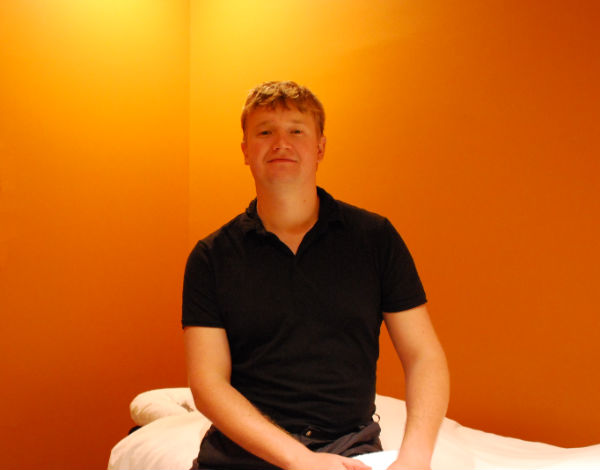 photo of sergey at his massage table