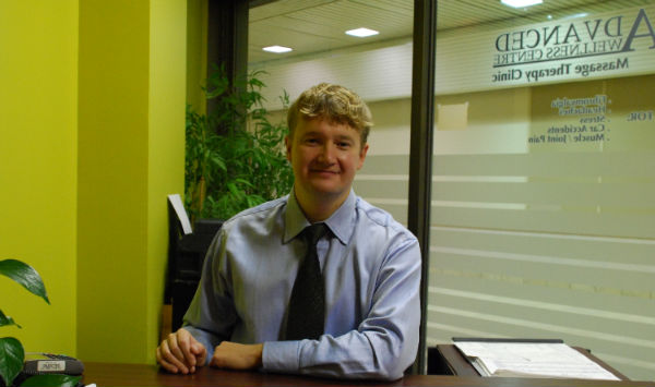 photo of sergey at his desk